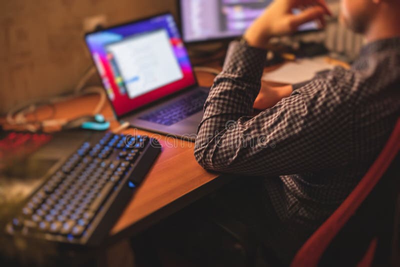 It Developer Programmer Working and Coding on His Worplace at Home