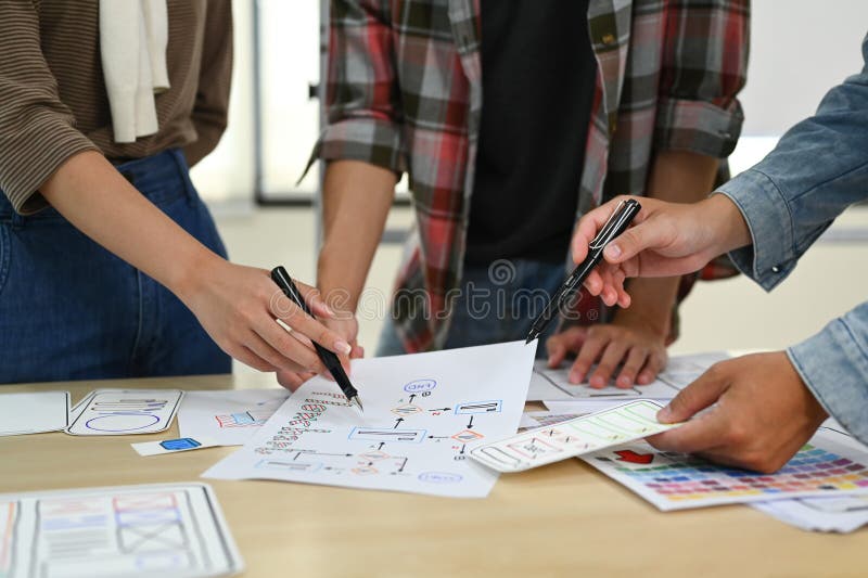 Developer team working on development project for mobile application at creative office. User experience concept royalty free stock images