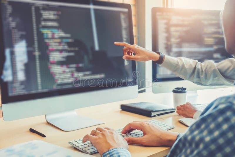 Developing programmer Team Development Website design and coding technologies working in software company office stock image