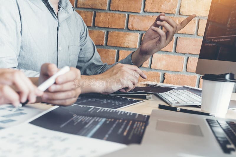 Developing programmer Team Development Website design and coding technologies working at software company office. Developing programmer stock images, royalty-free photos and pictures