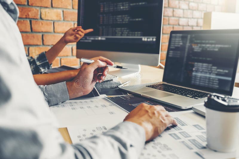 Developing programmer team Development Website design and coding technologies working at software company office royalty free stock photography.