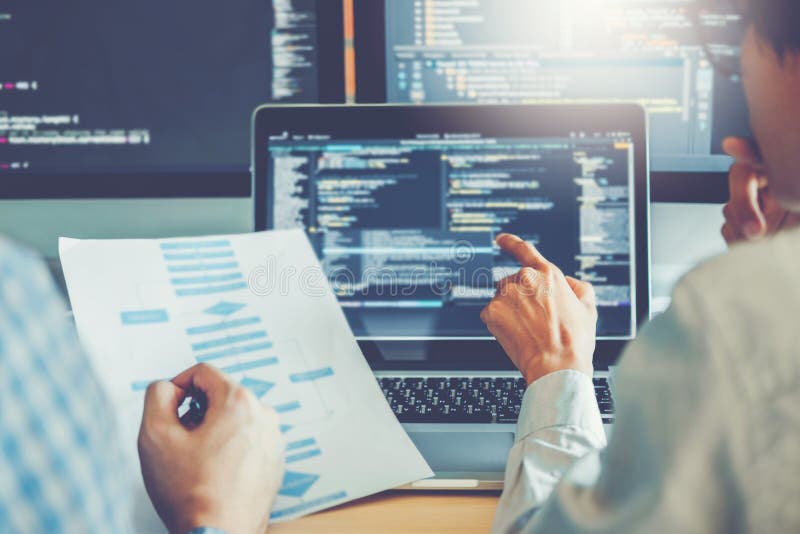 Developing programmer Team Development Website design and coding technologies working in software company office. Developing programmer stock images, royalty-free photos and pictures