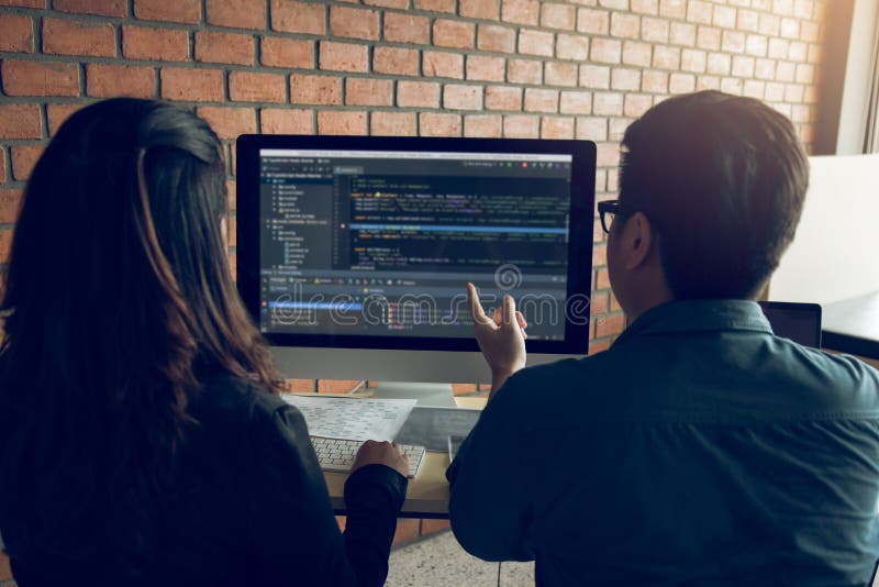 Developing programming and coding technologies working in a software engineers developing applications together in office royalty free stock photos