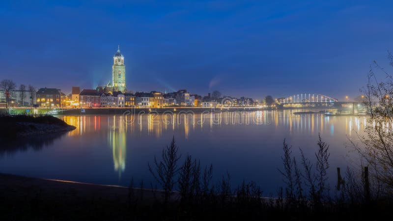 Deventer skyline, blue hour at the river IJssel