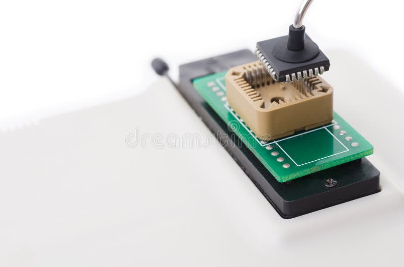 Insert flash memory to programmer socket. Developing programmer stock images, royalty-free photos and pictures