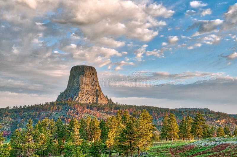 Devil`s Tower National Monument Under the Early Morning Cloudy Sky