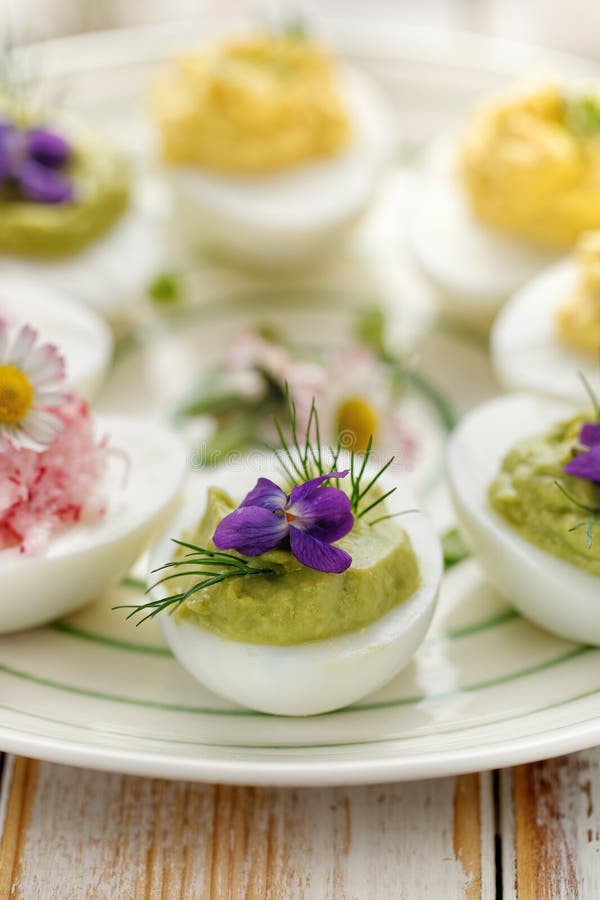 Deviled egg stuffed with avocado