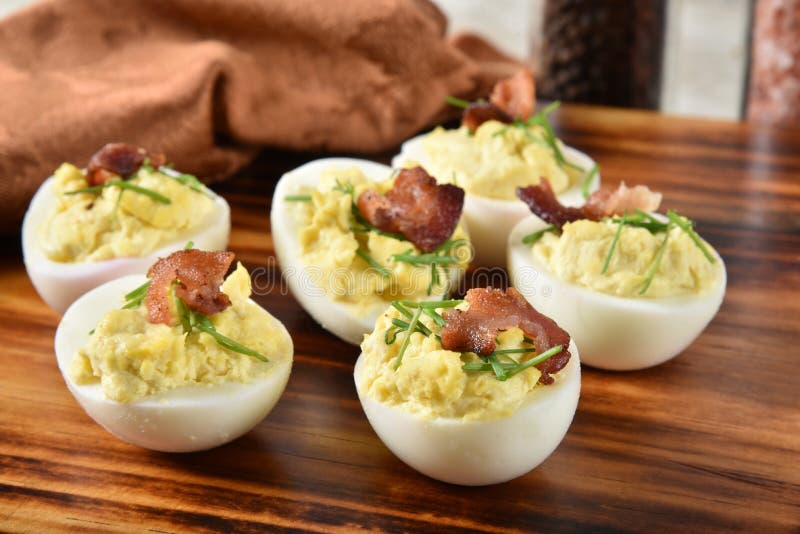 Deviled eggs with bacon appetizer stock photography