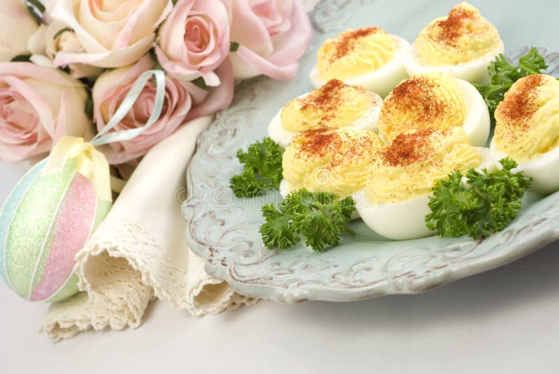 Deviled Eggs with Easter Plate and Decorations stock photo