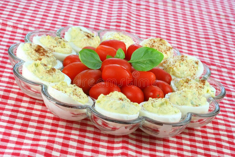 Deviled Eggs and Grape Tomatoes royalty free stock images