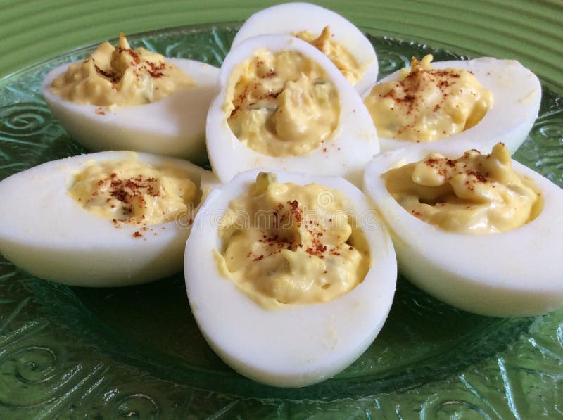 Deviled Eggs on Green Plate royalty free stock image