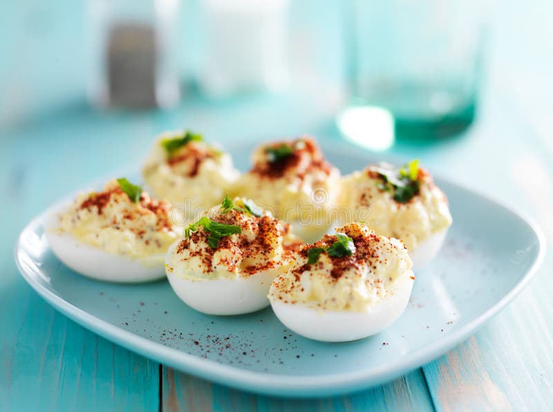 Deviled eggs with paprika royalty free stock photography