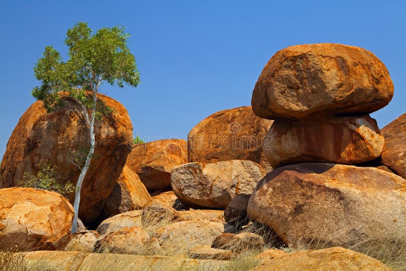 Devils marbles outback Australia granite boulders stock photos