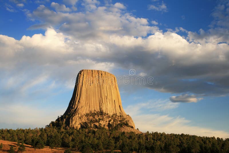 Devils tower national monument in wyoming with late afternoon light and clouds. Devils tower stock images, royalty-free photos and pictures