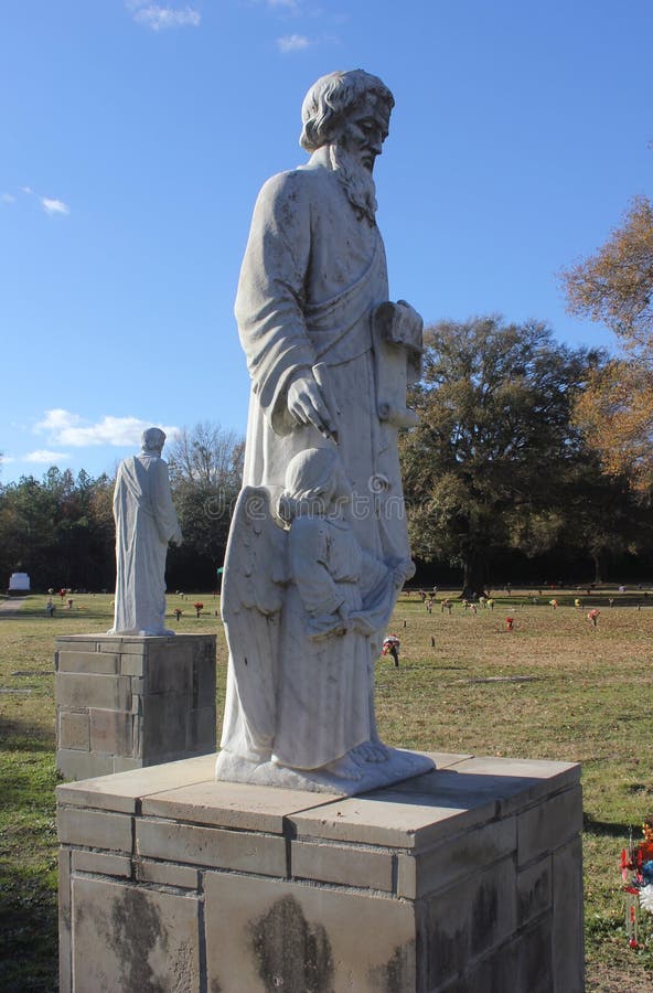 Tyler TX - December 27, 2023: Historic Statues at Memorial Park Cemetery Located in Tyler Texas. Tyler TX - December 27, 2023: Historic Statues at Memorial Park Cemetery Located in Tyler Texas