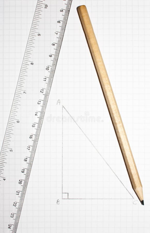 A metaphor for back to the basics or back to drawing board represented by a pencil, a ruler and a triangle. A metaphor for back to the basics or back to drawing board represented by a pencil, a ruler and a triangle.