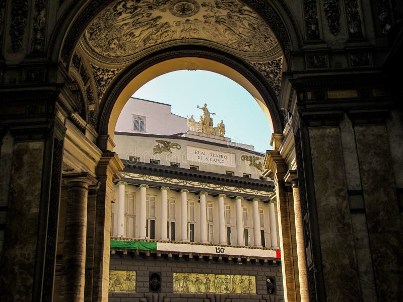 View of the facade of the Teatro di San Carlo as seen from the Galleria Umberto I. In Naples, Italy. View of the facade of the Teatro di San Carlo as seen from the Galleria Umberto I. In Naples, Italy