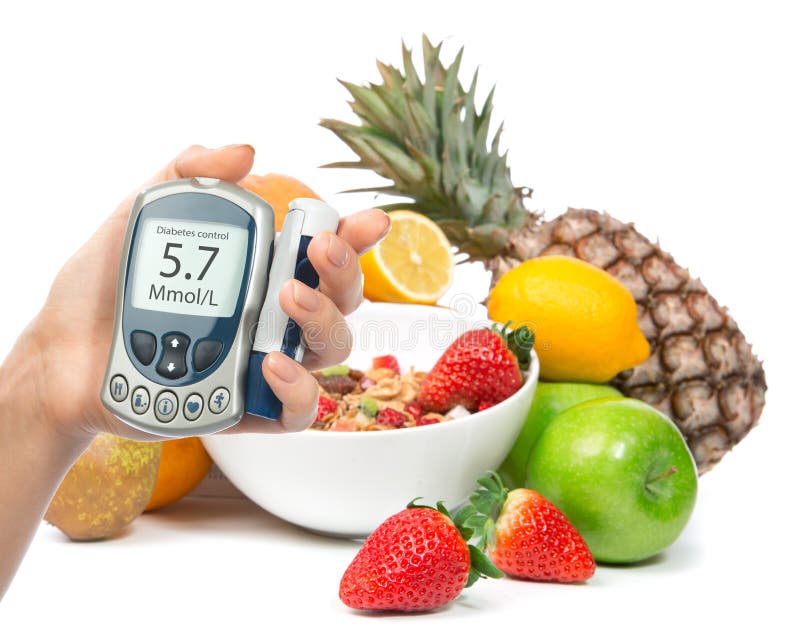 Diabetes diabetic concept glucose meter in hand and healthy organic food stock photo Diabetes diabetic concept glucose meter in hand and healthy organic food stock photo