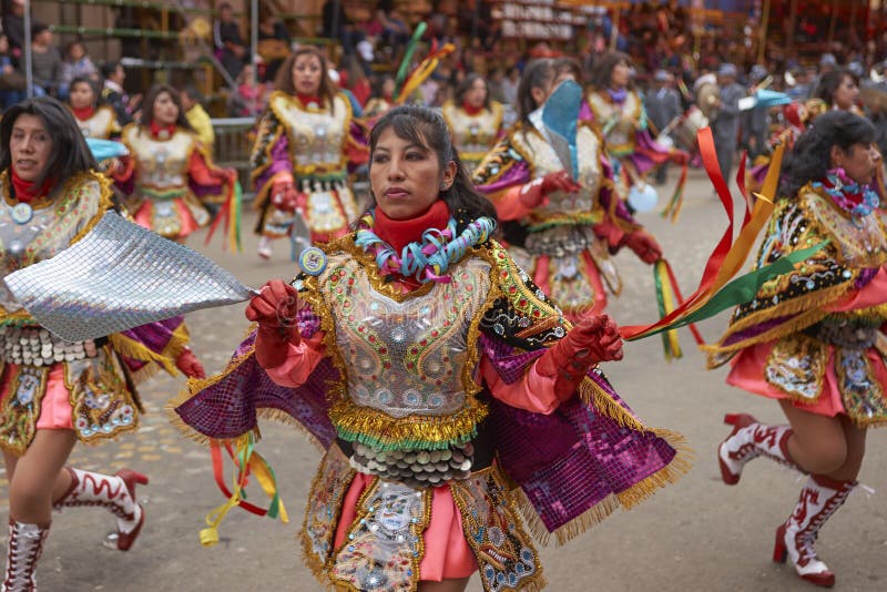 Diablada dancers at the Oruro Carnival in Bolivia. Diablada dancers in ornate costumes parade through the mining city of Oruro on the Altiplano of Bolivia during royalty free stock image