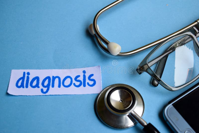 Diagnosis inscription with the view of stethoscope, eyeglasses and smartphone on the blue backgroundDiagnosis inscription with the royalty free stock photo