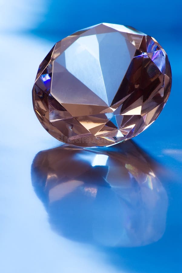 Diamond in blue light stock photos