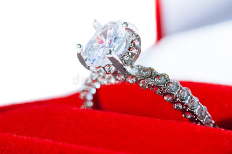 Diamond Engagement Ring in Red Box on White Background Stock Photo