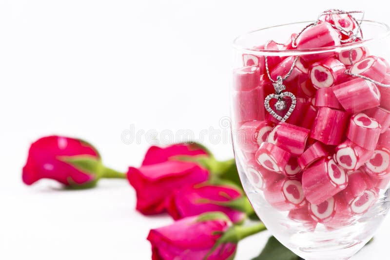 Diamond pendant and candy with rose