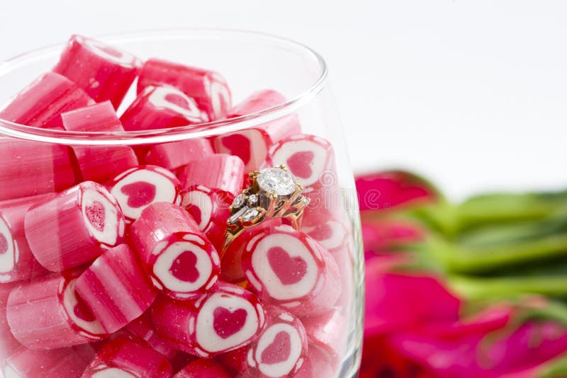 Diamond Ring and Candy in wine glass