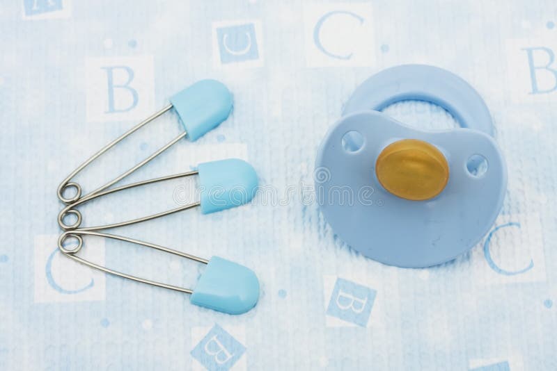 Diaper Pins and Pacifier stock image. Image of textured - 11843637