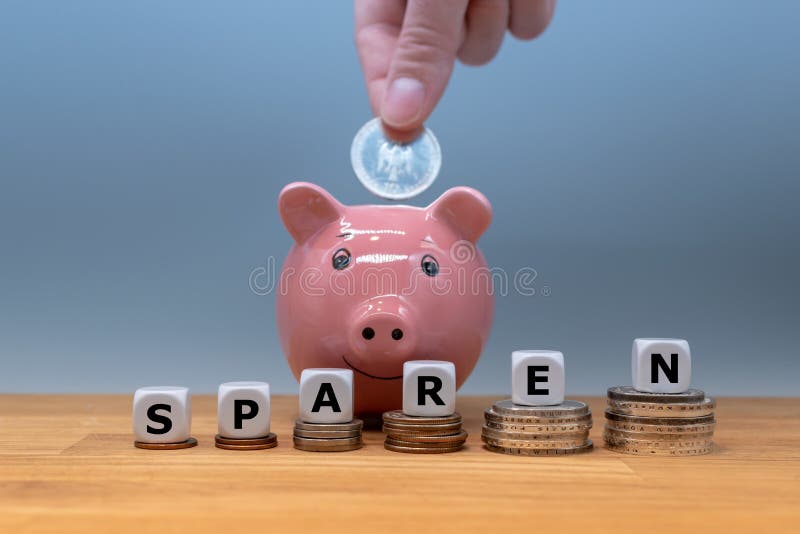 Dice form the German word `sparen` `save money` in English royalty free stock images Dice form the German word `sparen` `save money` in English royalty free stock images