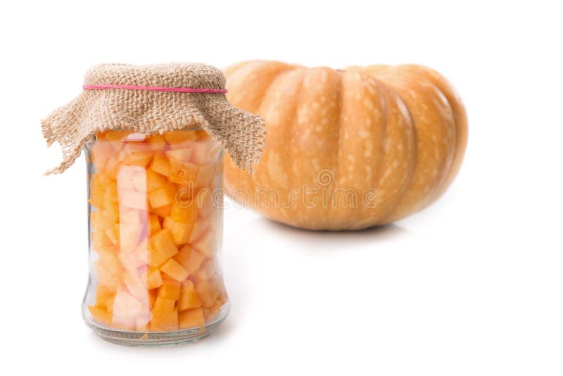 Diced pumpkin in a glass jar.