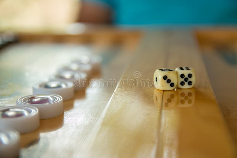 Dices for backgammon. Back gammon table game close up shot.