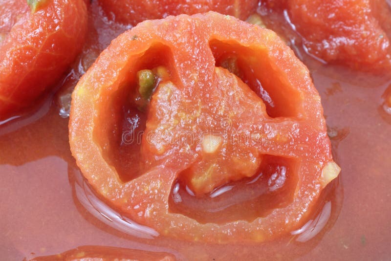Dichte mening van gesneden gestoofde tomaten