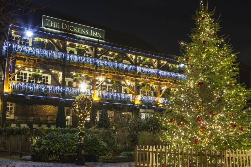 A view of The Dickens Inn Public House at situated in St. Katherine Docks in London during Christmas. A view of The Dickens Inn Public House at situated in St. Katherine Docks in London during Christmas.