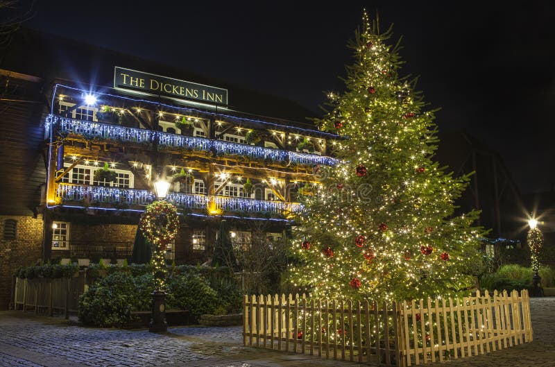 A view of The Dickens Inn Public House at situated in St. Katherine Docks in London during Christmas. A view of The Dickens Inn Public House at situated in St. Katherine Docks in London during Christmas.