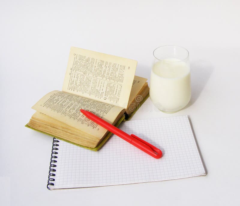 Dictionary and glass of milk