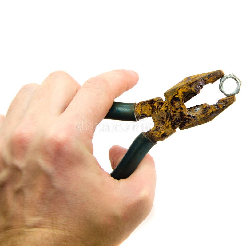 Die alten Zangen in der Hand werden isoliert stockbild Die alten Zangen in der Hand werden isoliert stockbild