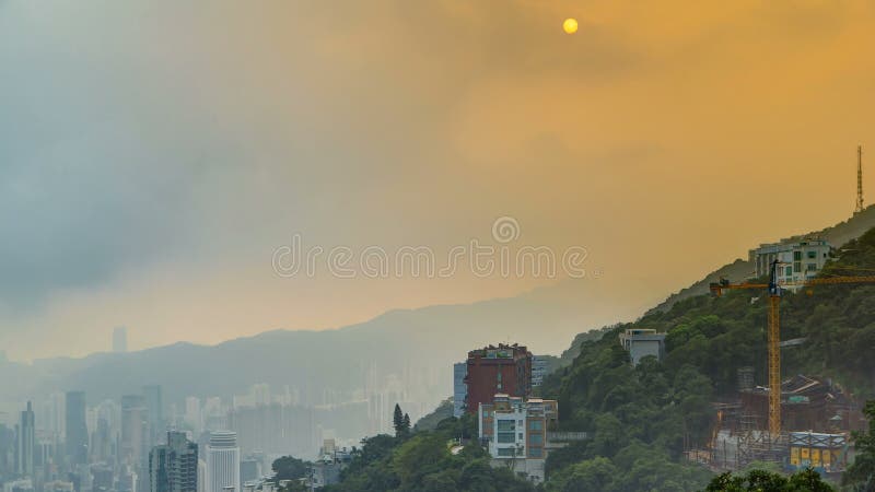Die berühmte Ansicht von Hong Kong von Victoria Peak-timelapse Genommen bei Sonnenaufgang, während die Sonne über Hügel in Kowloo