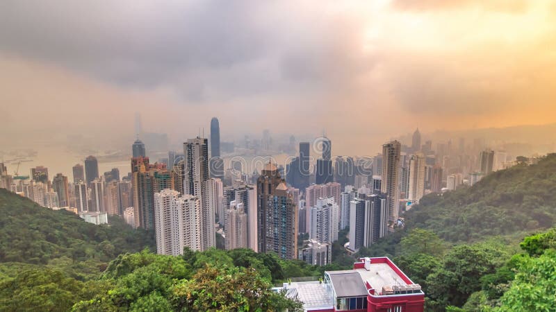 Die berühmte Ansicht von Hong Kong von Victoria Peak-timelapse Genommen bei Sonnenaufgang, während die Sonne über Kowloon-Bucht k