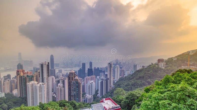 Die berühmte Ansicht von Hong Kong von Victoria Peak-timelapse Genommen bei Sonnenaufgang, während die Sonne über Kowloon-Bucht k