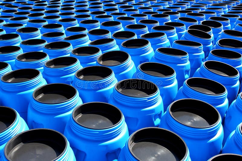 The blue plastic barrels for storage of chemicals. The blue plastic barrels for storage of chemicals