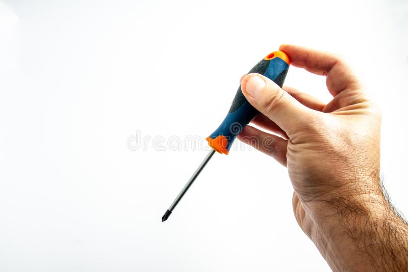 die Hand der Arbeitskraft mit Schraubenzieher in der Hand lizenzfreies stockfoto die Hand der Arbeitskraft mit Schraubenzieher in der Hand lizenzfreies stockfoto