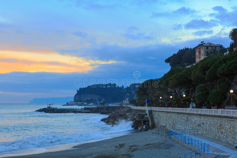 The shoreline and waterfront of Celle Ligure at sunset, Liguria, italy. The shoreline and waterfront of Celle Ligure at sunset, Liguria, italy