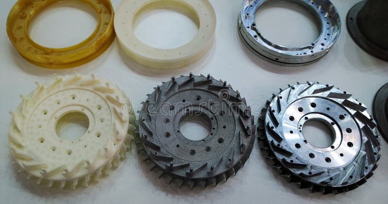 Mechanical engineering parts made of metal and plastic, printed on 3D printer. Quality Technology Innovation concept. Industrial development. Sample. Mechanical engineering parts made of metal and plastic, printed on 3D printer. Quality Technology Innovation concept. Industrial development. Sample