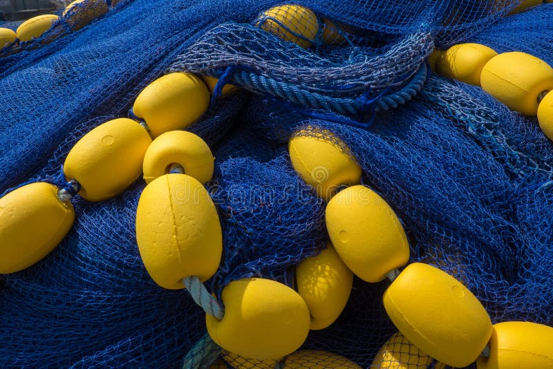 Diep blauw visnet met gele floaters royalty-vrije stock fotografie Diep blauw visnet met gele floaters royalty-vrije stock fotografie