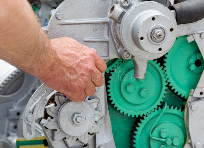 Close up of human hand showing how diesel engine working. Generator cutaway stock images, royalty-free photos and pictures