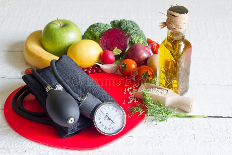 Diet and healthy food on a red heart stock image Diet and healthy food on a red heart stock image