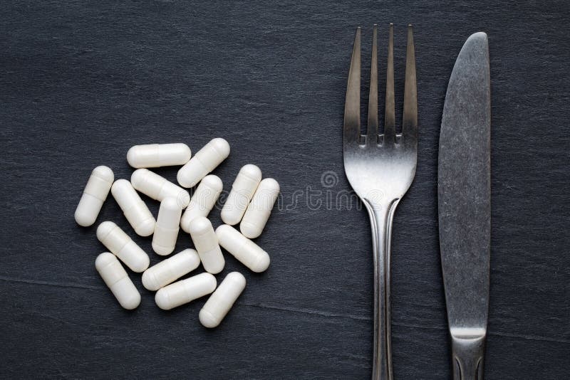 Diet Pills With Fork And Knife Stock Photo Image Of Concept