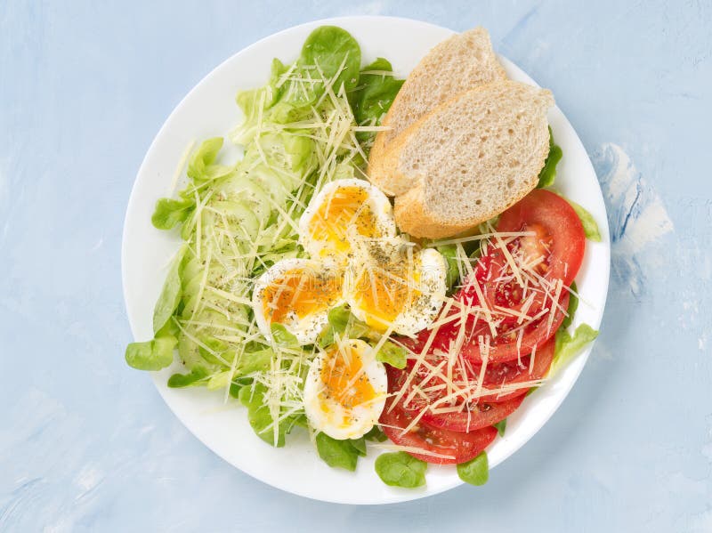 Diet Salad with Soft Boiled Eggs, Grated Cheese and Vegetables