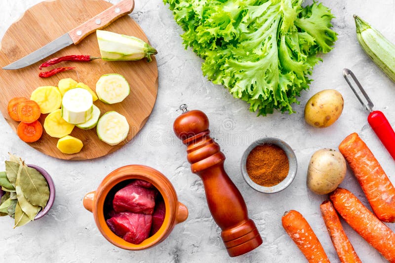 Diet vegetarian vegan food. Ratatouille or vegetable ragout. Stone table background top view stock images Diet vegetarian vegan food. Ratatouille or vegetable ragout. Stone table background top view stock images